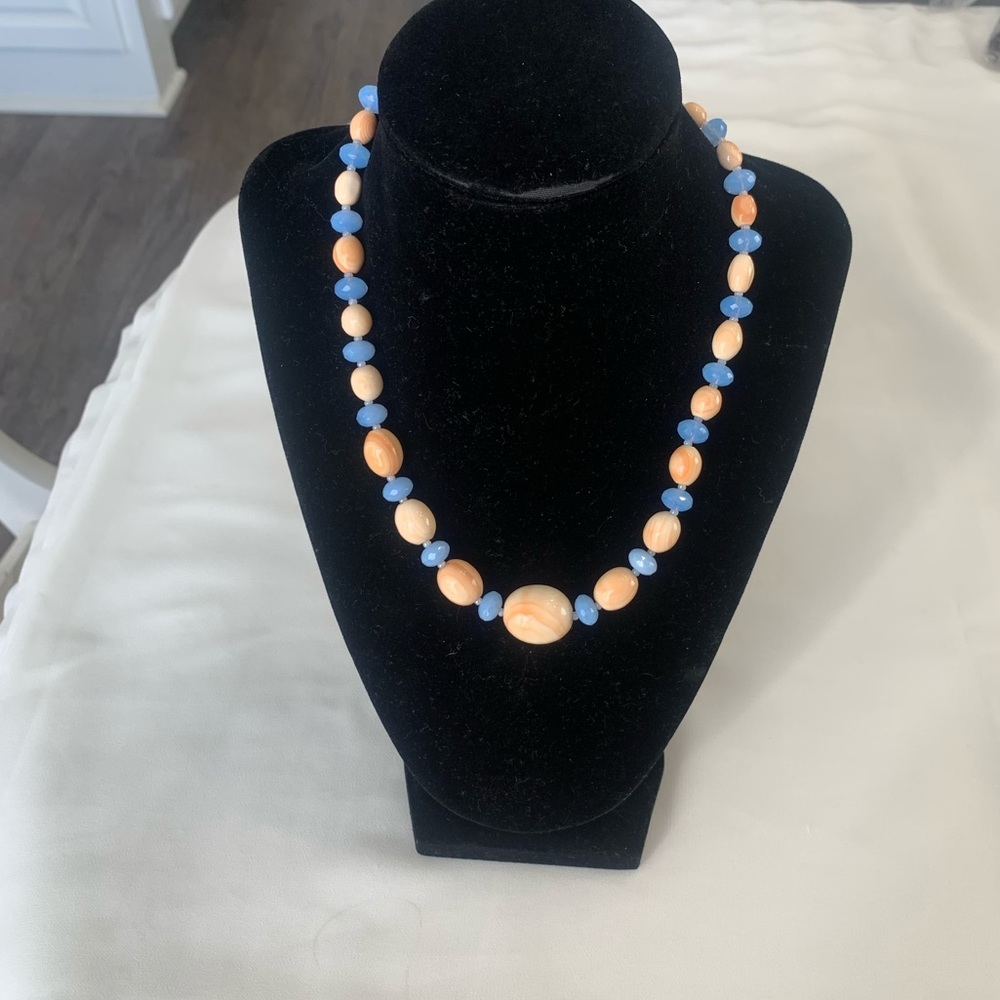 Polished coral and blue glass beads